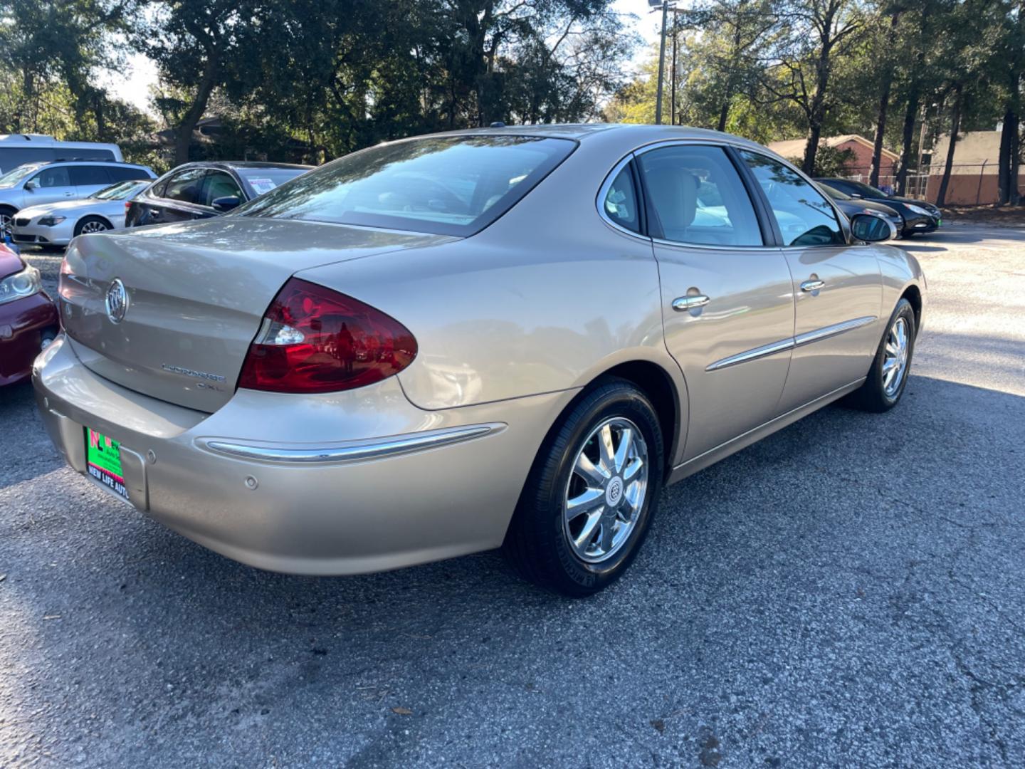 2005 GOLD BUICK LACROSSE CXL (2G4WD562351) with an 3.8L engine, Automatic transmission, located at 5103 Dorchester Rd., Charleston, SC, 29418-5607, (843) 767-1122, 36.245171, -115.228050 - Local Trade-in with Leather, CD/AM/FM, OnStar, Dual Climate Control, Power Everything (windows, locks, seats, mirrors), Keyless Entry, Chrome Wheels. Clean CarFax (no accidents reported!) Only 119k miles! Located at New Life Auto Sales! 2023 WINNER for Post & Courier's Charleston's Choice Pre-owned - Photo#6